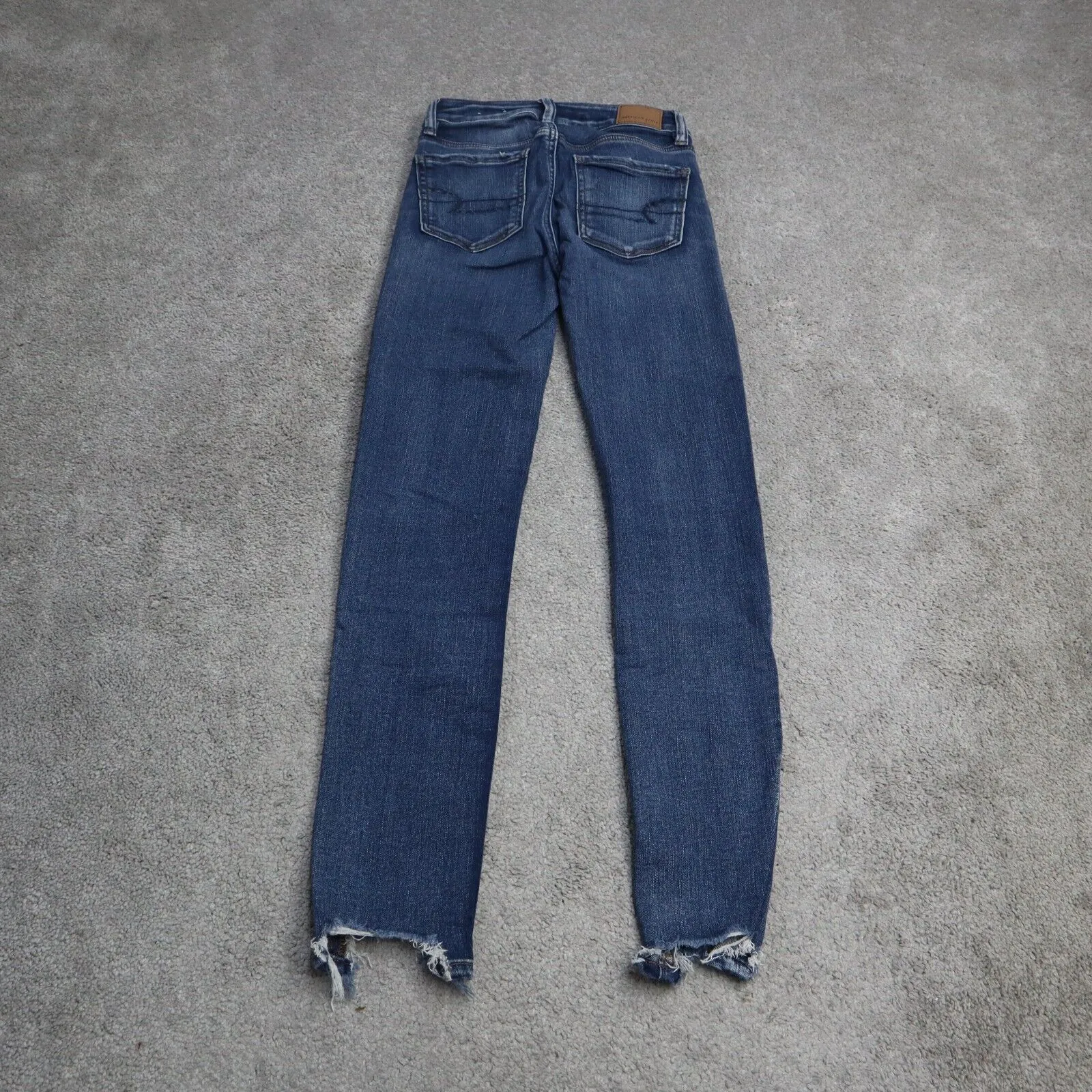 American Eagle Women Skinny Leg Jeans Denim Distressed Stretch Raw Hem Blue SZ 0